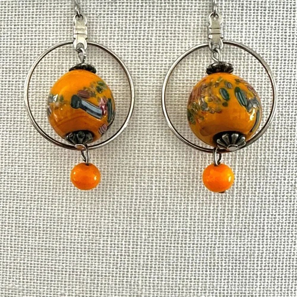 Silver tone orangeβbeaded dropβearrings